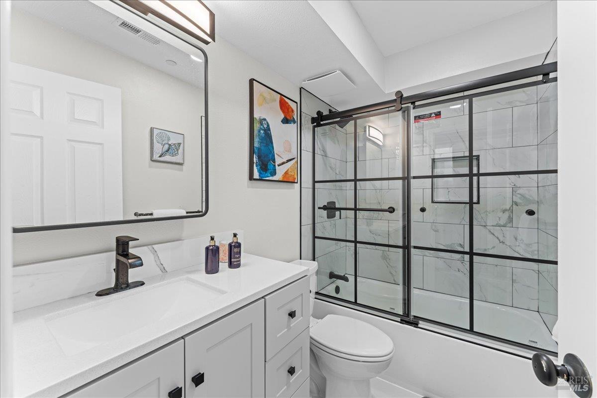 30 Fair Drive San Rafael, CA 94901 - Photo 13 of 33 a bathroom with a sink toilet and shower