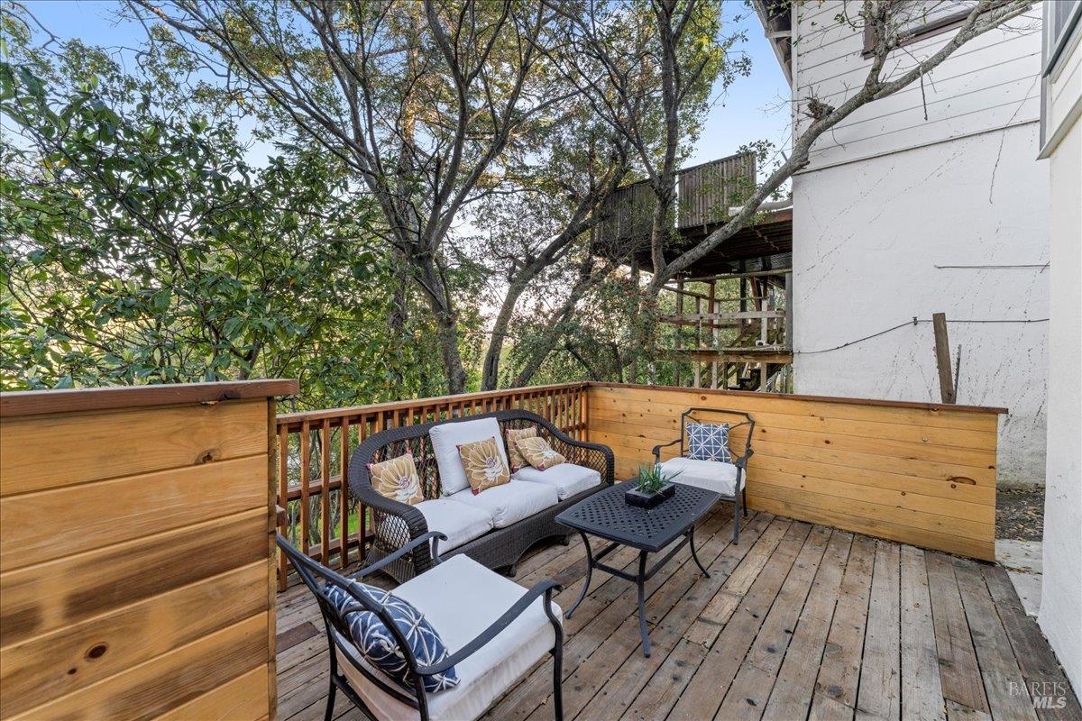 30 Fair Drive San Rafael, CA 94901 - Photo 30 of 33 a roof deck with a table and chairs