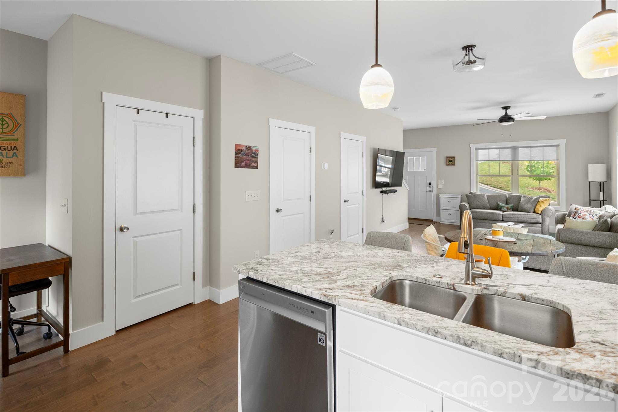 52 Wheeler Road Weaverville, NC 28787 - Photo 11 of 21 a kitchen with a sink and a refrigerator