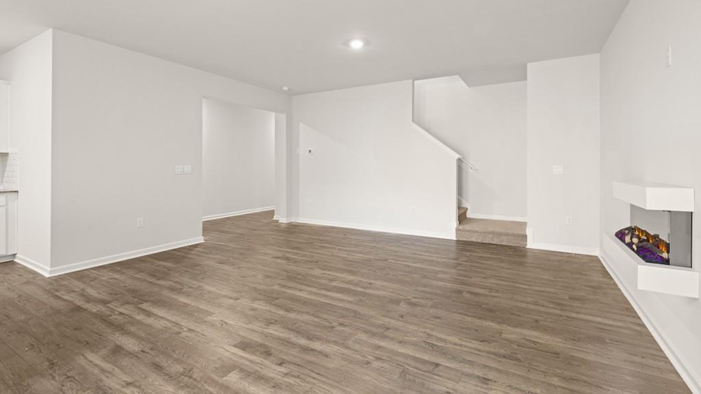 47 Rustin Ridge Dahlonega, GA 30533 - Photo 10 of 27 a view of an empty room with wooden floor