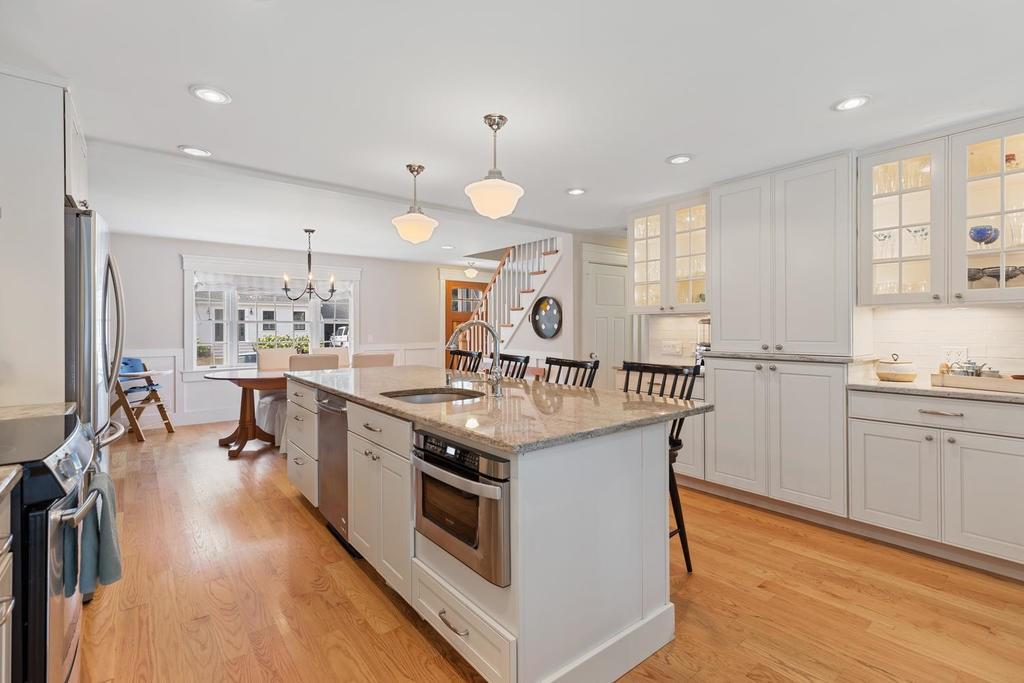 18 Moccasin Path Arlington, MA 02474 - Photo 13 of 33 a kitchen with stainless steel appliances granite countertop a stove and a sink