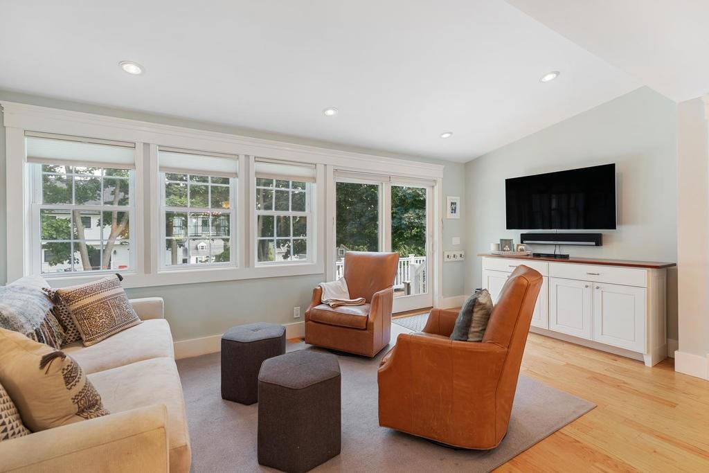 18 Moccasin Path Arlington, MA 02474 - Photo 14 of 33 a living room with furniture and a flat screen tv