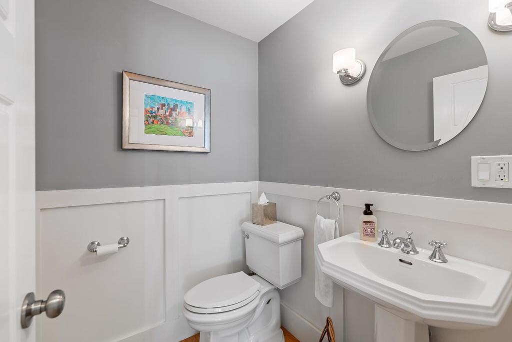 18 Moccasin Path Arlington, MA 02474 - Photo 16 of 33 a bathroom with a toilet sink and mirror