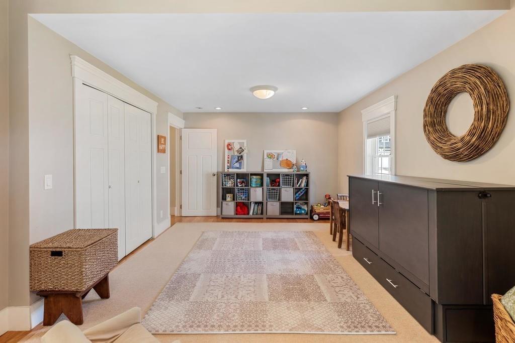 18 Moccasin Path Arlington, MA 02474 - Photo 18 of 33 a view of a room with furniture and toys