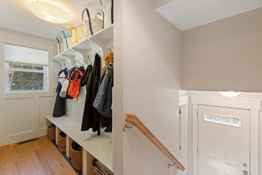 18 Moccasin Path Arlington, MA 02474 - Photo 20 of 33 a view of walk in closet with clothes and shoes