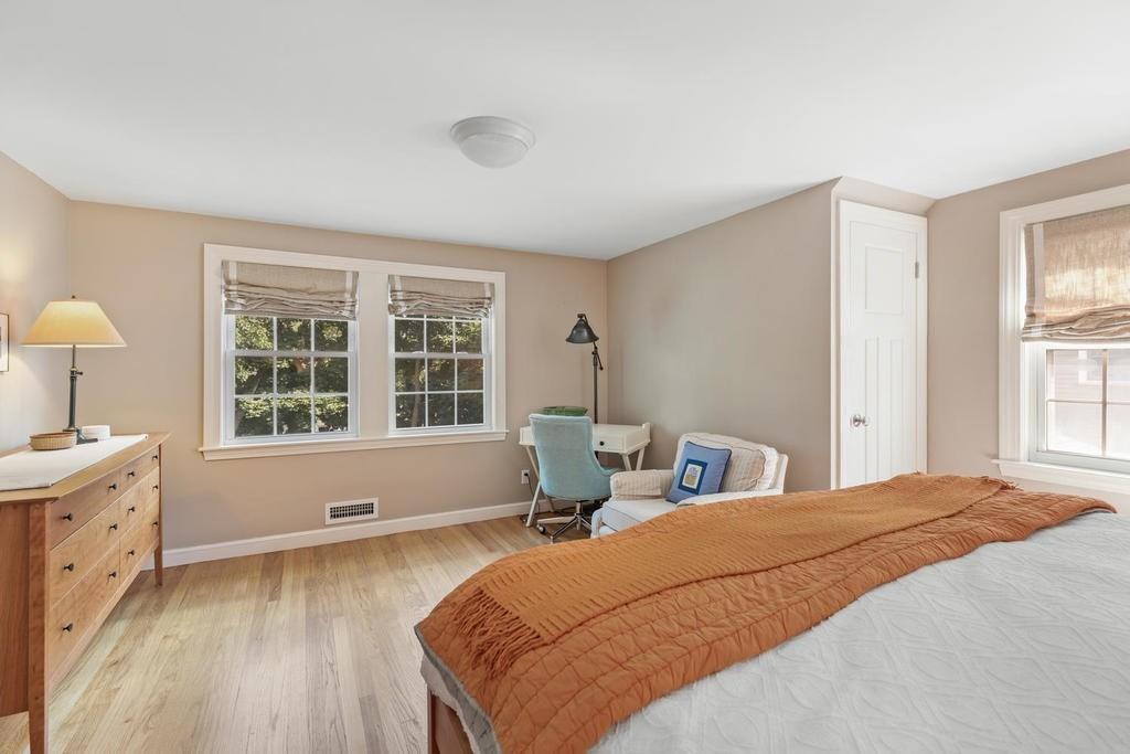 18 Moccasin Path Arlington, MA 02474 - Photo 23 of 33 a bedroom with a bed and a window
