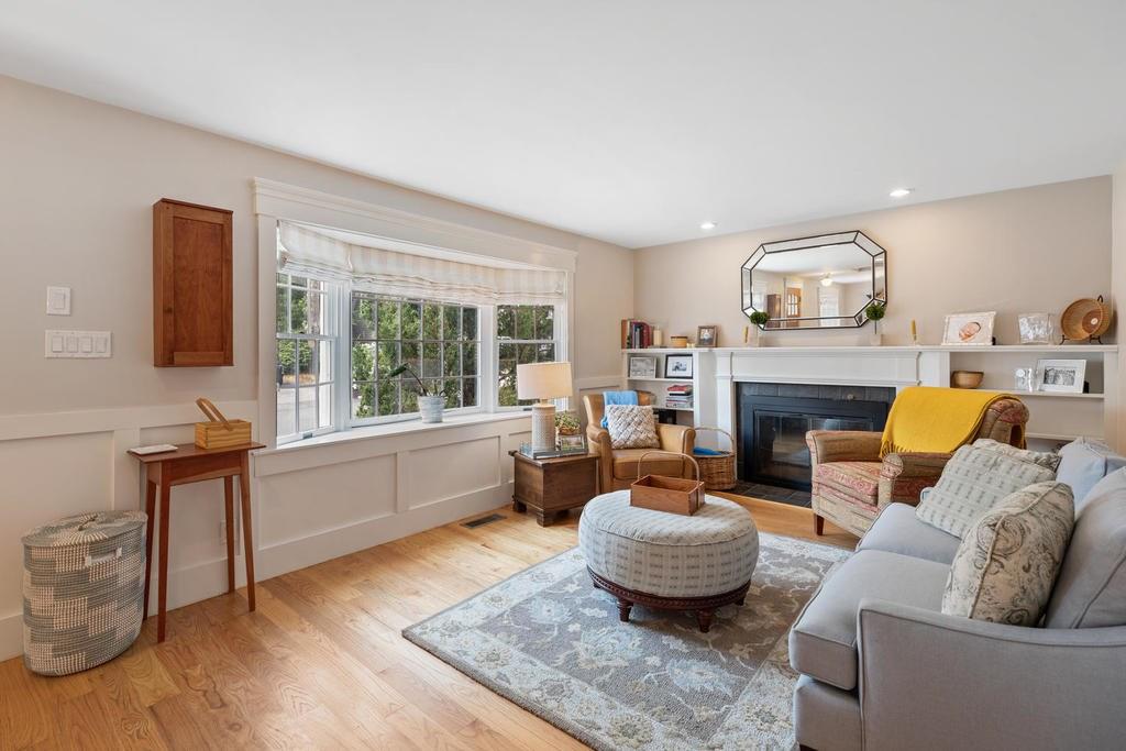 18 Moccasin Path Arlington, MA 02474 - Photo 5 of 33 a living room with furniture and a fireplace