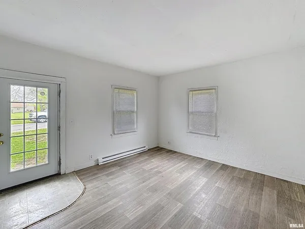 an empty room with windows