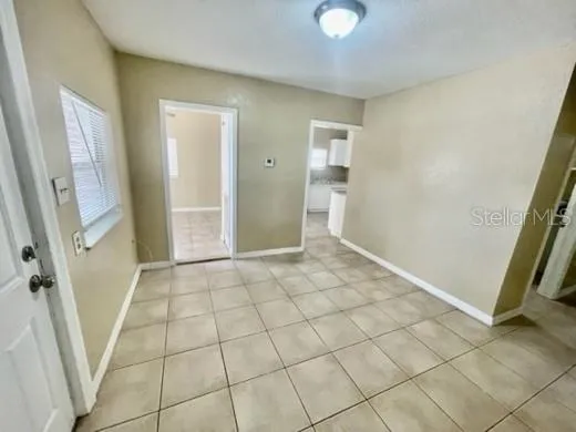 a view of an empty room and entrance