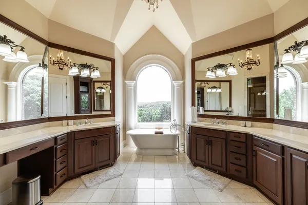 a bathroom with a bathtub and a sink