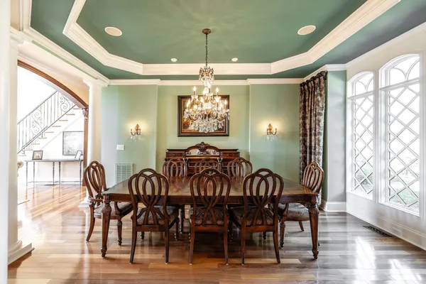 a view of a dining room with furniture window and outside view