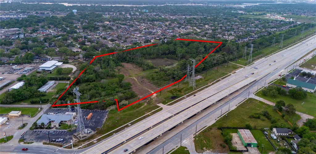 Tbd Nicholson Street Seabrook, TX 77586 - Photo 5 of 5 a view of a yard with wooden floor
