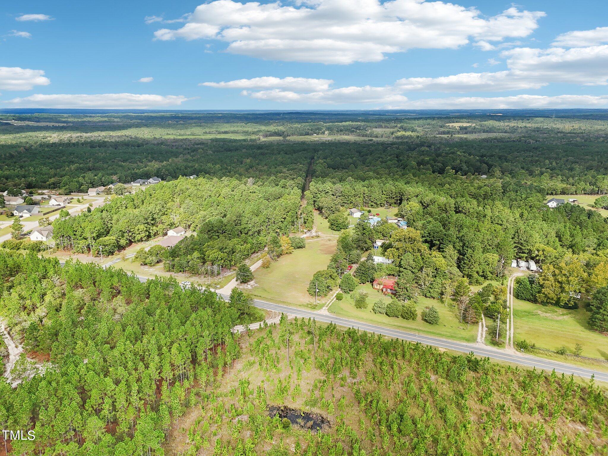 60 Hale Storm Lane Cameron, NC 28326 - Photo 14 of 24 a view of a lake from a yard