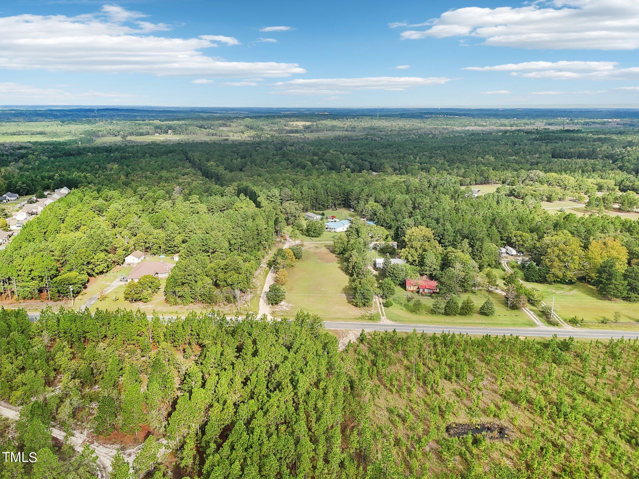 60 Hale Storm Lane Cameron, NC 28326 - Photo 15 of 24 a view of a lake with a yard