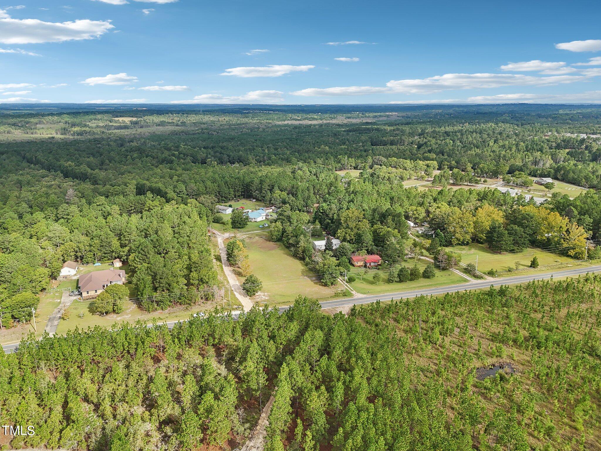 60 Hale Storm Lane Cameron, NC 28326 - Photo 16 of 24 a view of a lake with a yard