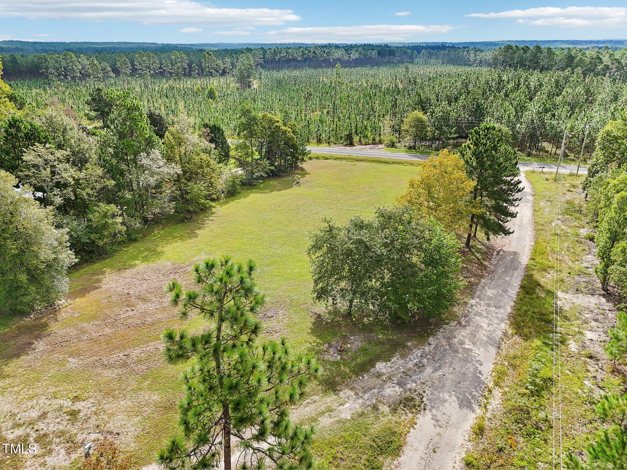 60 Hale Storm Lane Cameron, NC 28326 - Photo 22 of 24 a view of a lake with a mountain view
