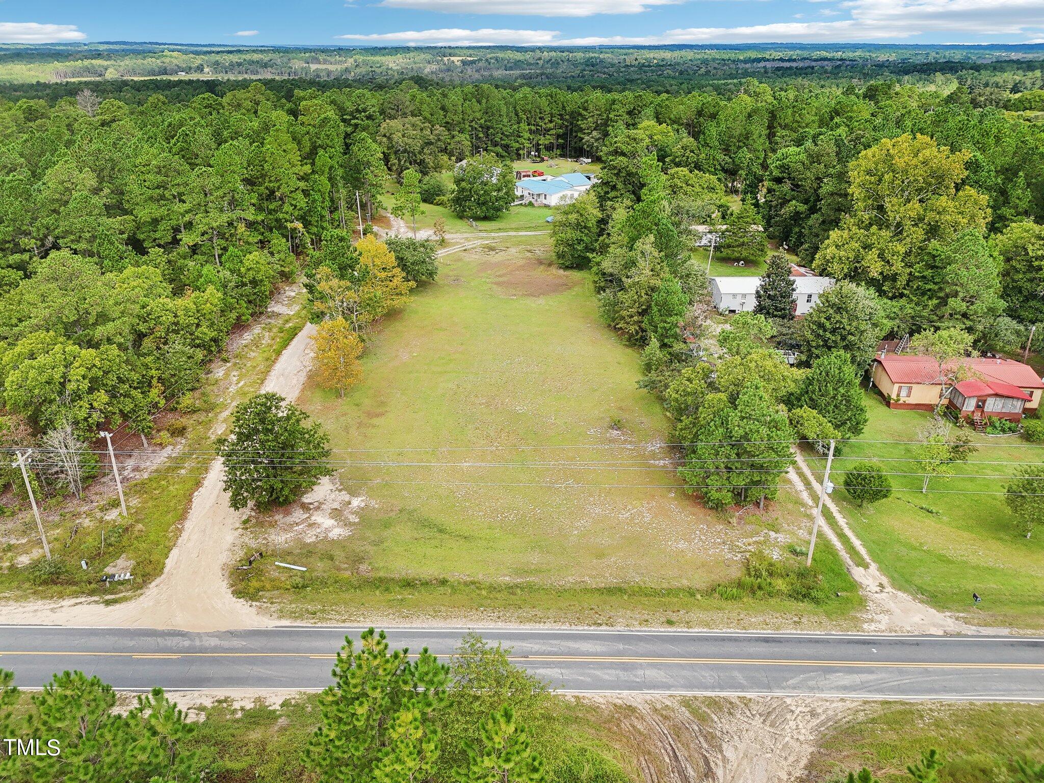 60 Hale Storm Lane Cameron, NC 28326 - Photo 6 of 24 a view of a garden with an outdoor space