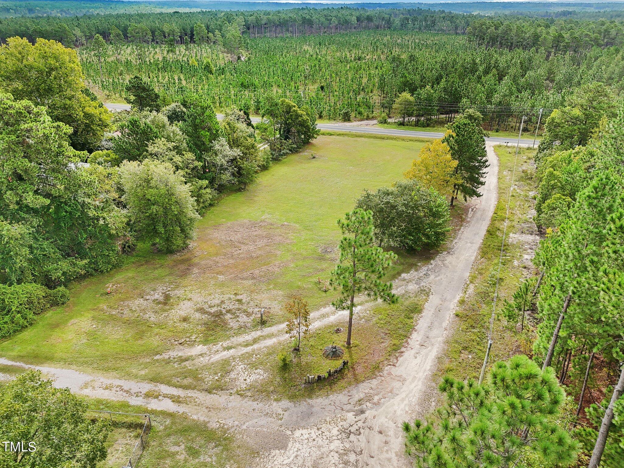 60 Hale Storm Lane Cameron, NC 28326 - Photo 8 of 24 a view of a lake with a yard
