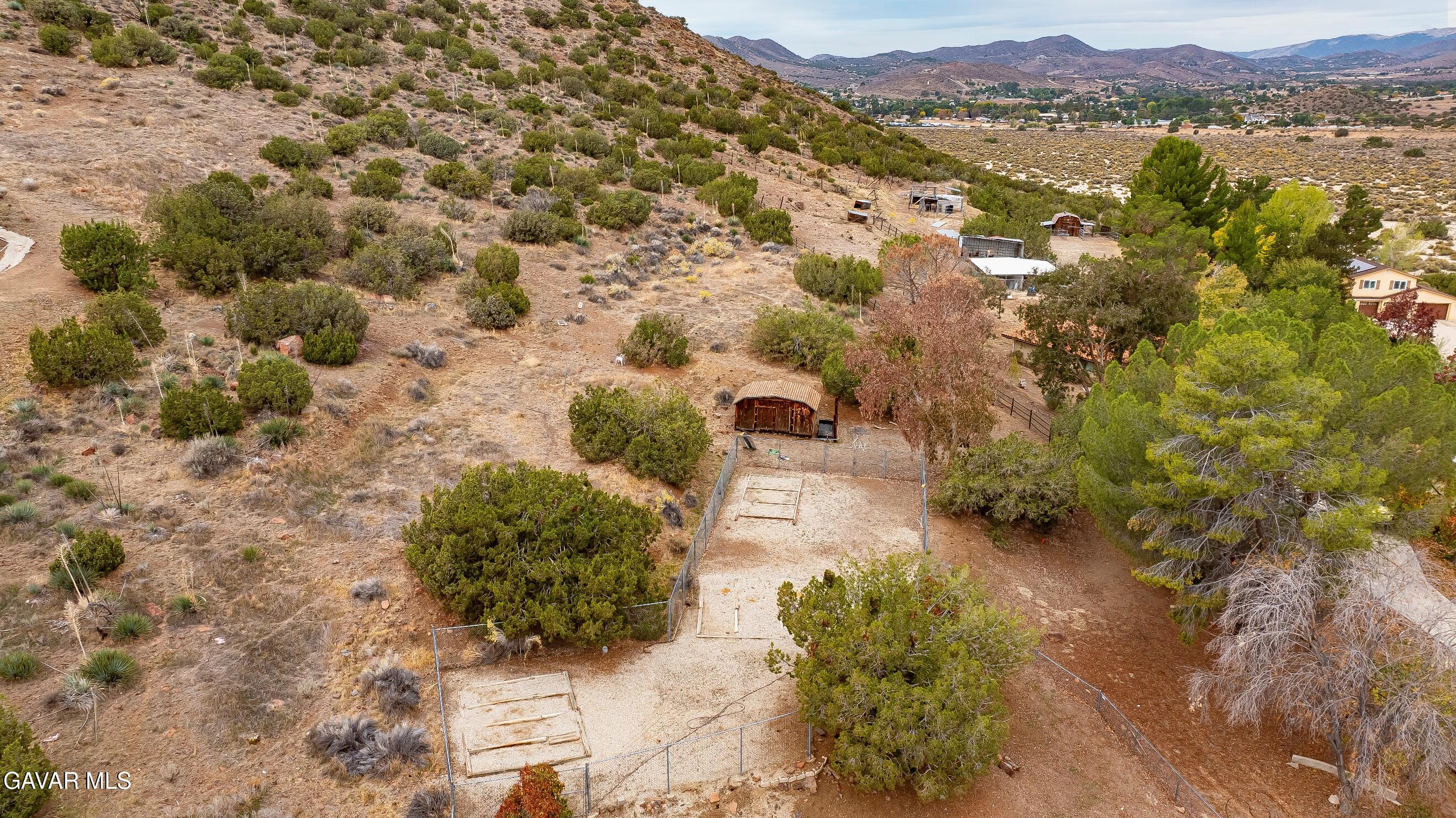 31741 Lake Meadow Road Acton, CA 93510 - Photo 47 of 59 a view of a lake with mountains in the background