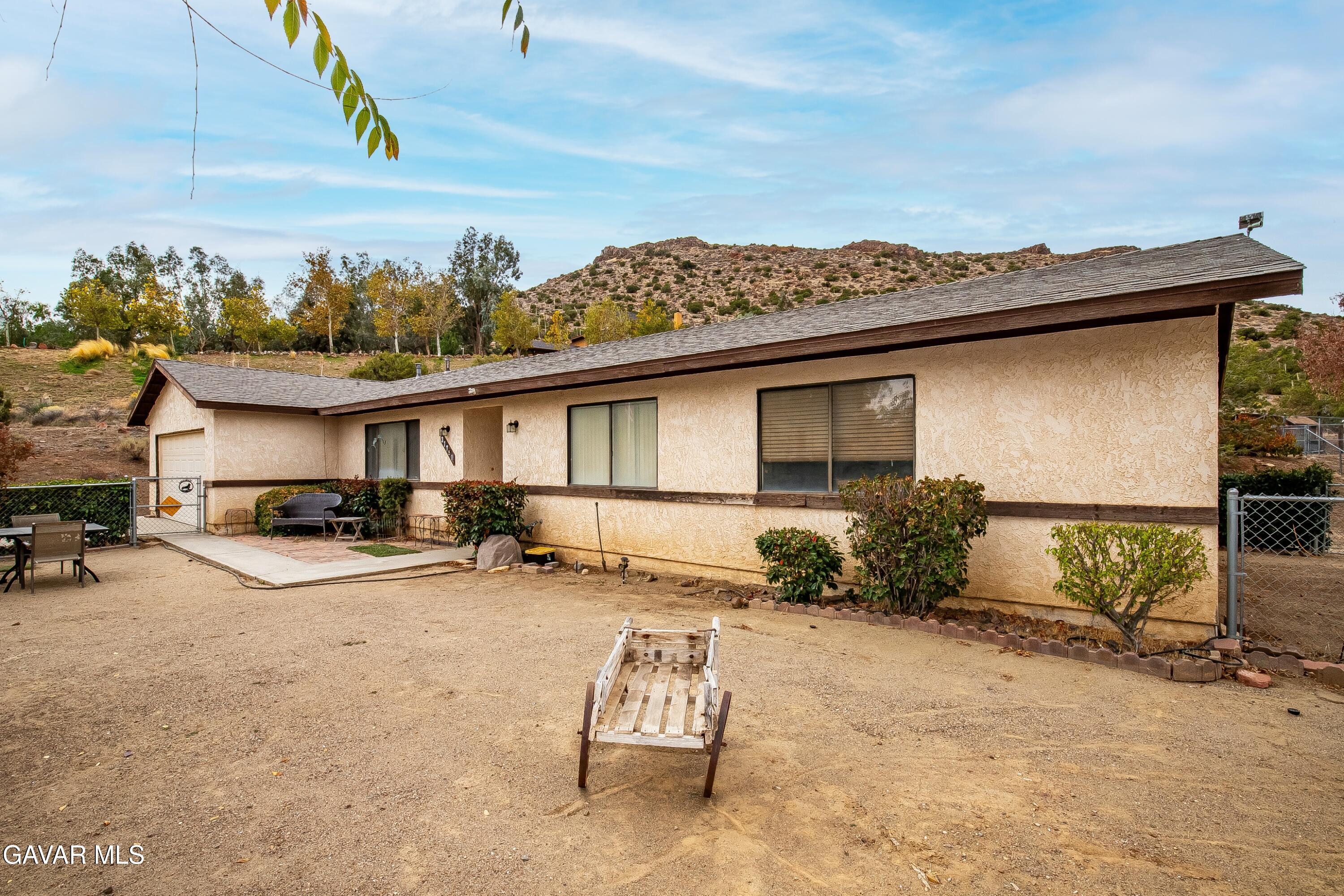 31741 Lake Meadow Road Acton, CA 93510 - Photo 56 of 59 a view of a house with a patio