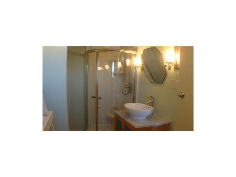 251 Otis Point Road St. George, ME 04860 - Photo 11 of 15 Updated master bath and laundry.