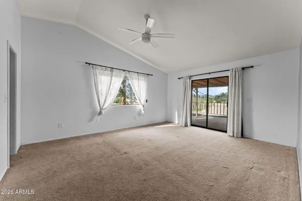 a kitchen with stainless steel appliances granite countertop a stove a refrigerator a sink and dishwasher with wooden floor