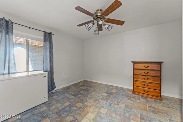 a view of empty room with a window