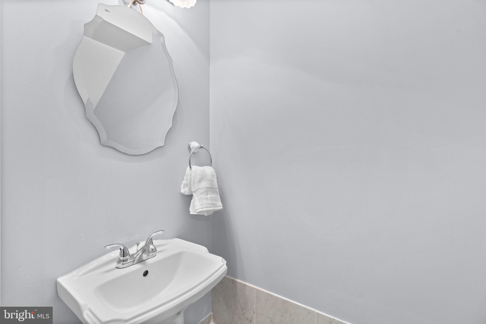 8614 Saxon Circle Nottingham, MD 21236 - Photo 37 of 48 Lower Level Powder Room