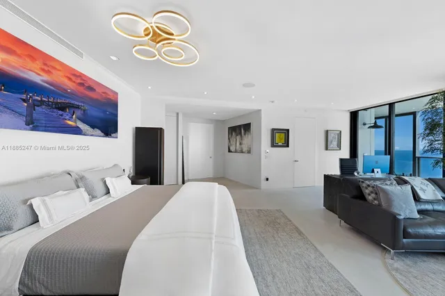 a kitchen with a stove a sink and a refrigerator