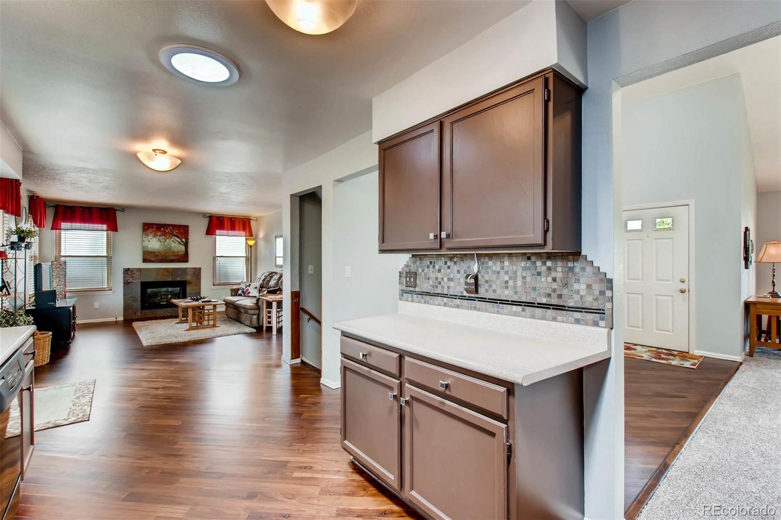 13360 Cherry Circle Thornton, CO 80241 - Photo 11 of 26 a kitchen with sink and cabinets