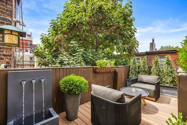 a view of a terrace with furniture