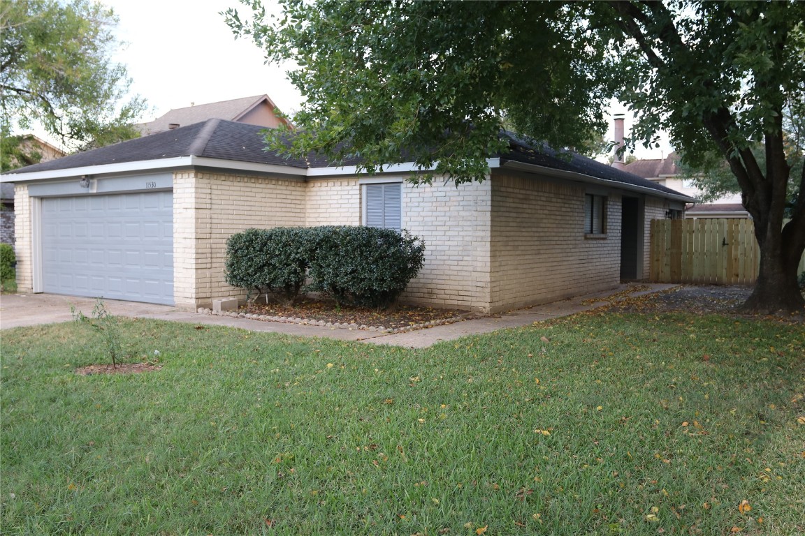 11530 Ridge Run Drive Houston, TX 77064 - Photo 4 of 38 a view of a backyard with potted plants and large tree