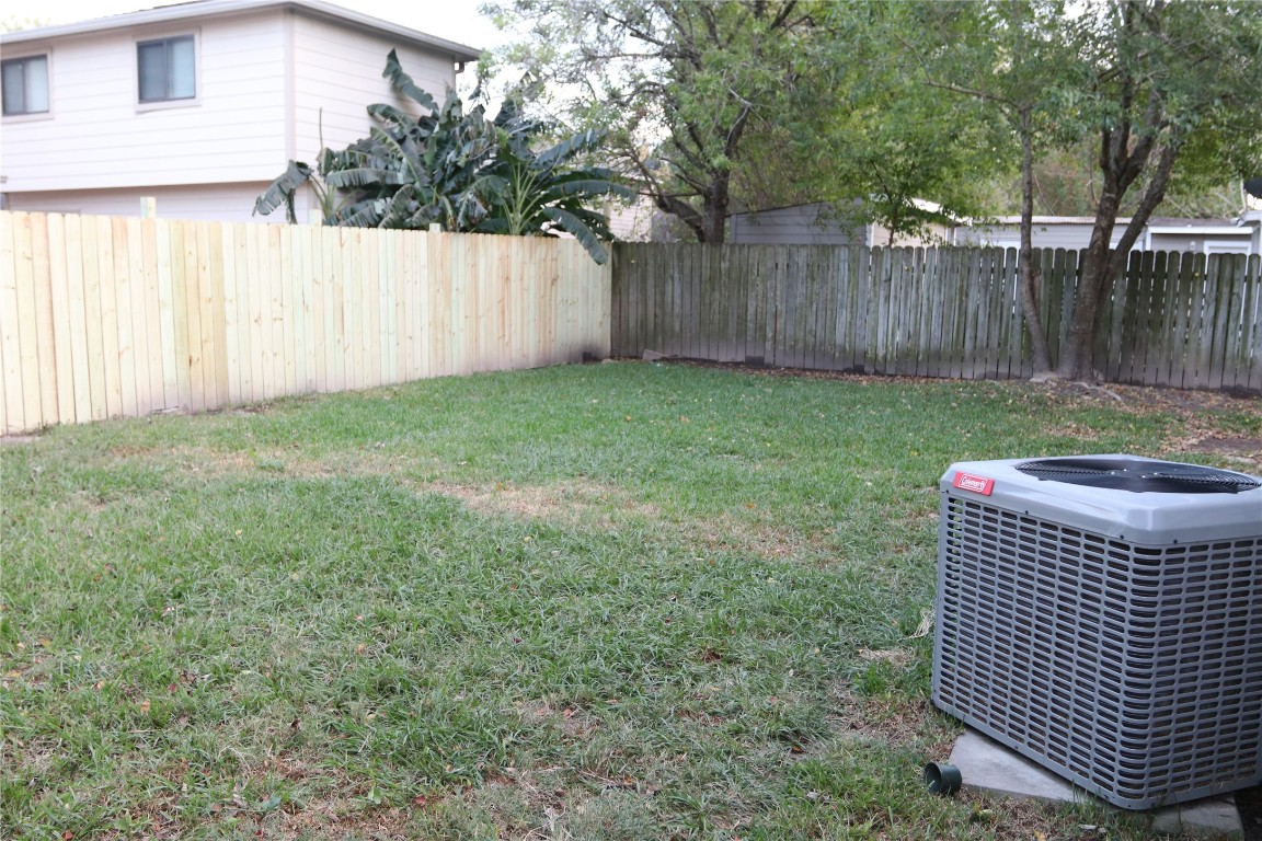 11530 Ridge Run Drive Houston, TX 77064 - Photo 6 of 38 a view of a backyard with a garden and trees