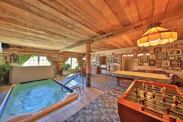 a view of a living room and a wooden floor