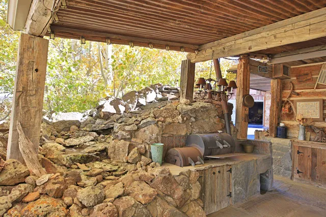 a outdoor living space with patio lots of furniture
