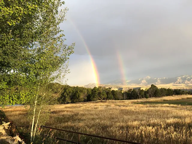 a view of a golf course with a swimming pool