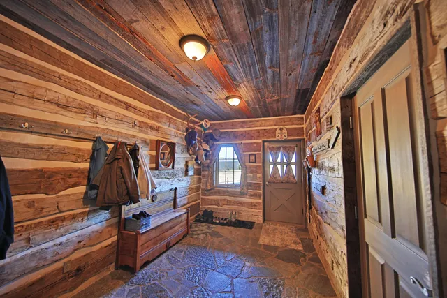 a view of walk in closet with clothes