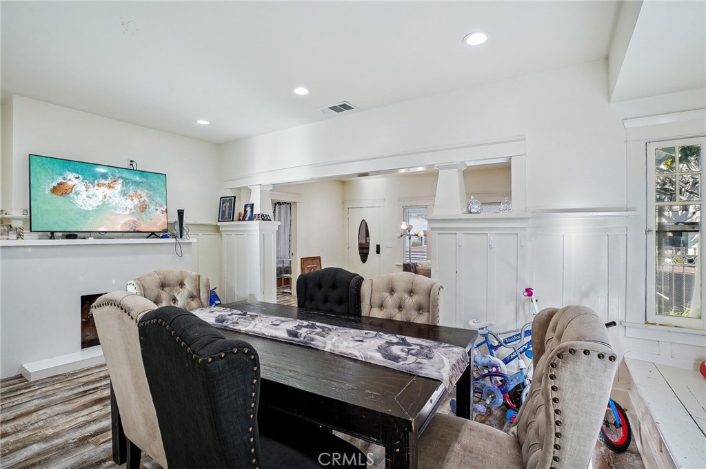 7251 Painter Avenue, Unit 7255 Whittier, CA 90602 - Photo 12 of 56 a living room with furniture and a flat screen tv