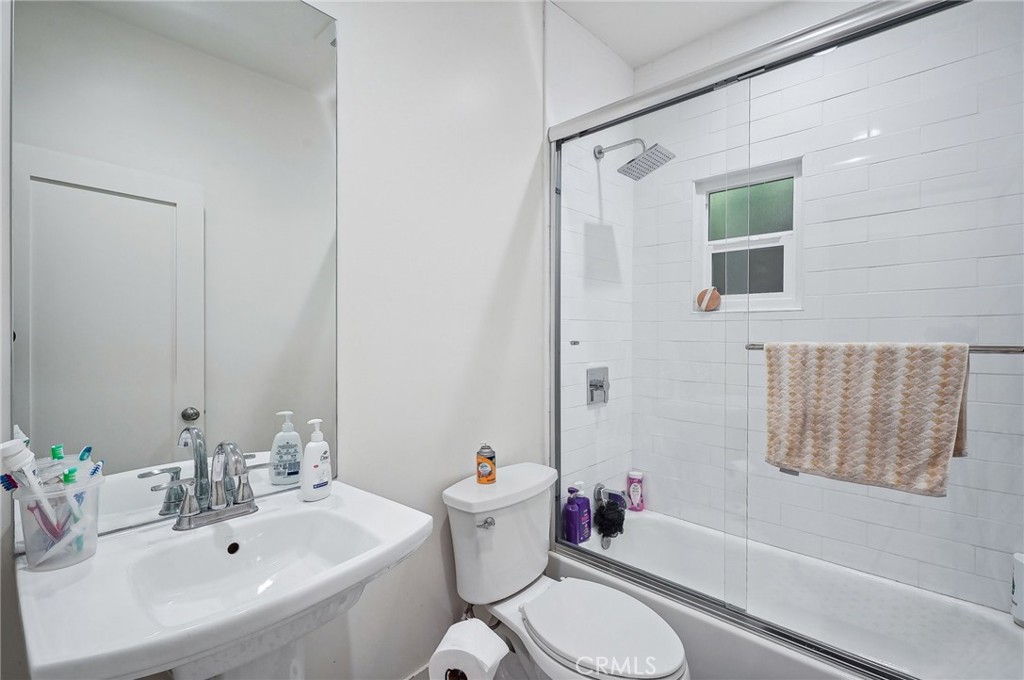 7251 Painter Avenue, Unit 7255 Whittier, CA 90602 - Photo 44 of 56 a bathroom with a sink toilet and shower