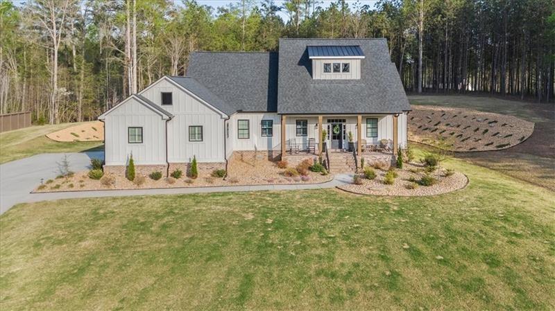 283 London Road Ball Ground, GA 30107 - Photo 61 of 73 a view of a house with pool and a yard
