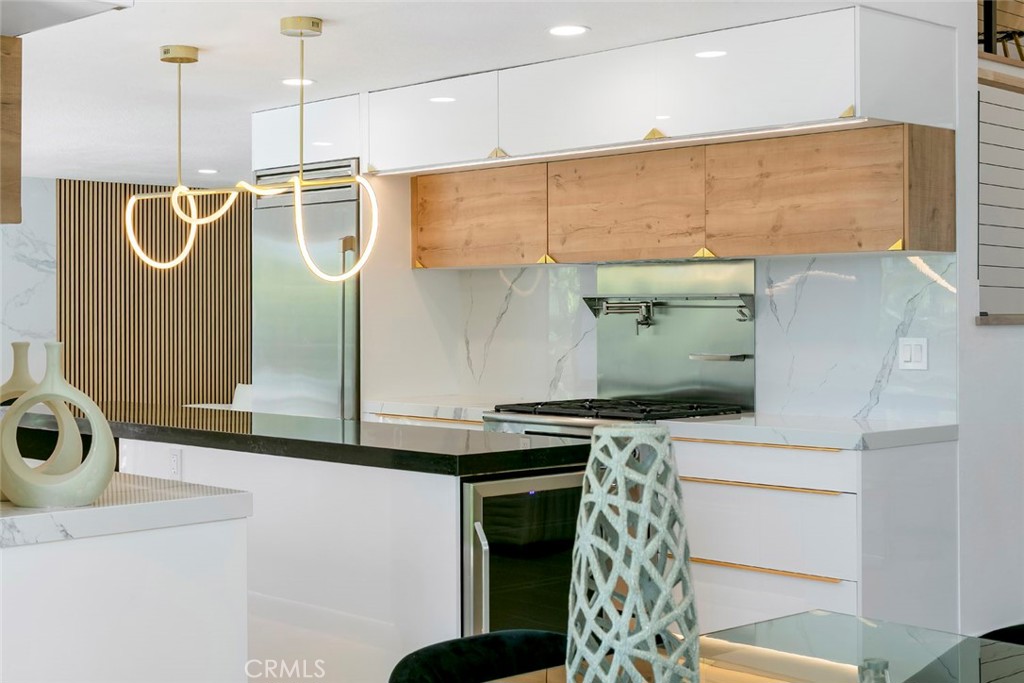 32232 Fall River Road Trabuco Canyon, CA 92679 - Photo 11 of 39 a bathroom with a sink a mirror and shower