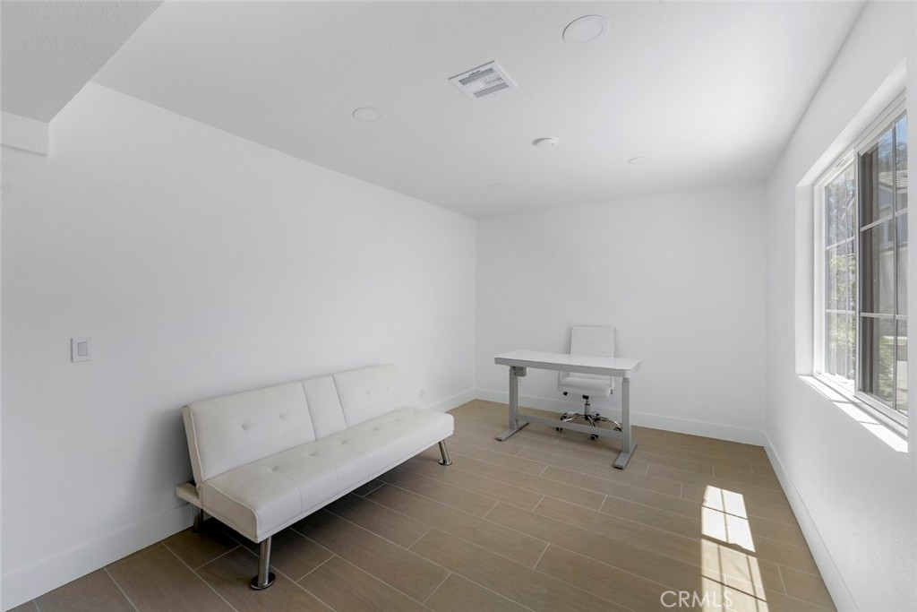 32232 Fall River Road Trabuco Canyon, CA 92679 - Photo 29 of 39 a living room with furniture and a window