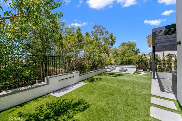 a view of balcony with yard