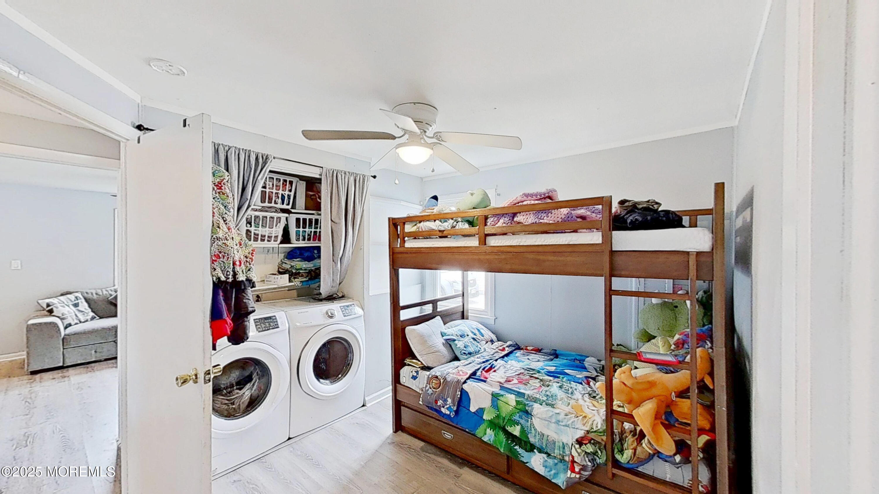 224 Sunset Lane Howell, NJ 07731 - Photo 15 of 23 a storage room with washer and dryer