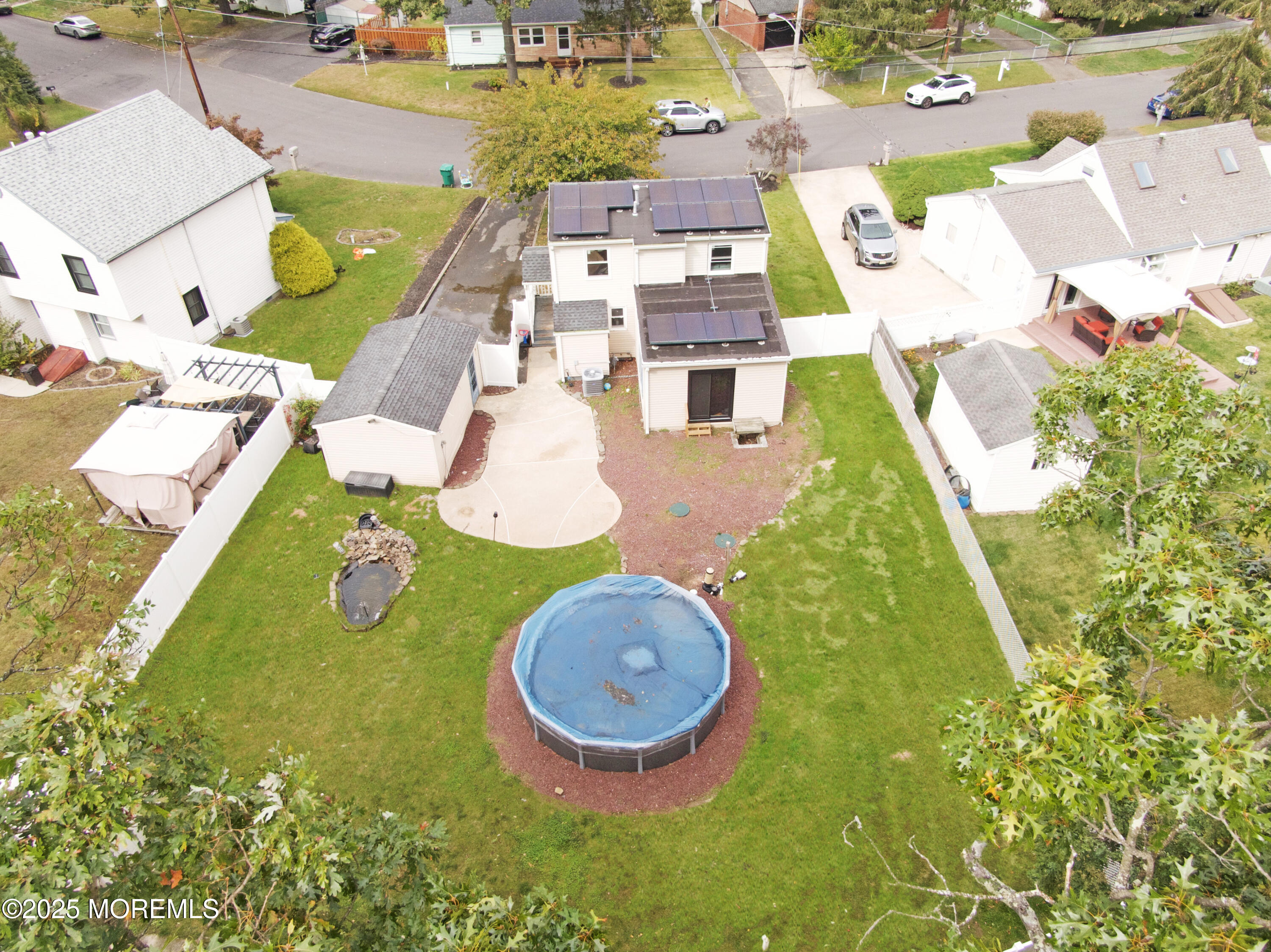 224 Sunset Lane Howell, NJ 07731 - Photo 20 of 23 an aerial view of a house with swimming pool and outdoor seating