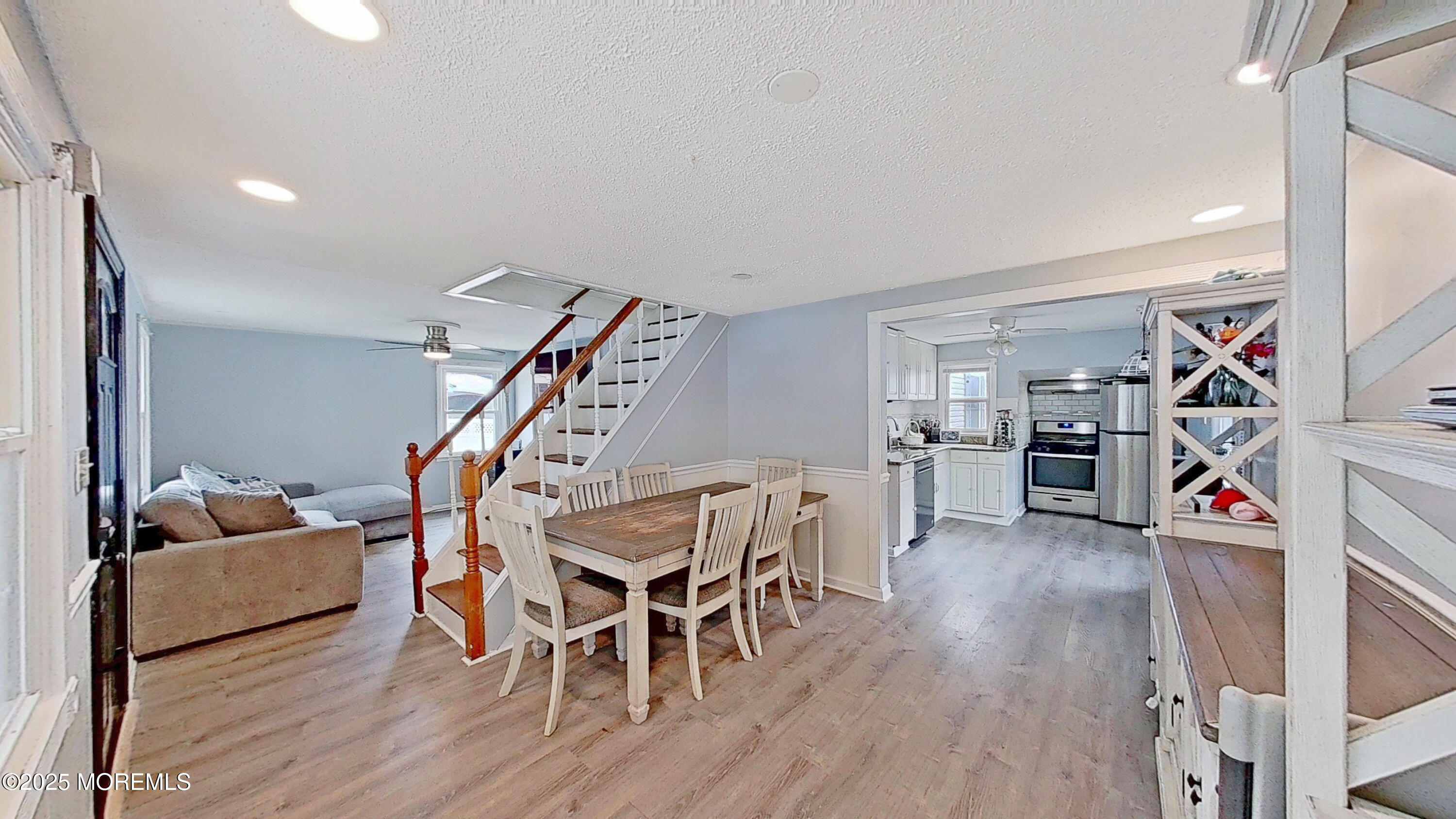 224 Sunset Lane Howell, NJ 07731 - Photo 3 of 23 a view of a room with furniture and wooden floor