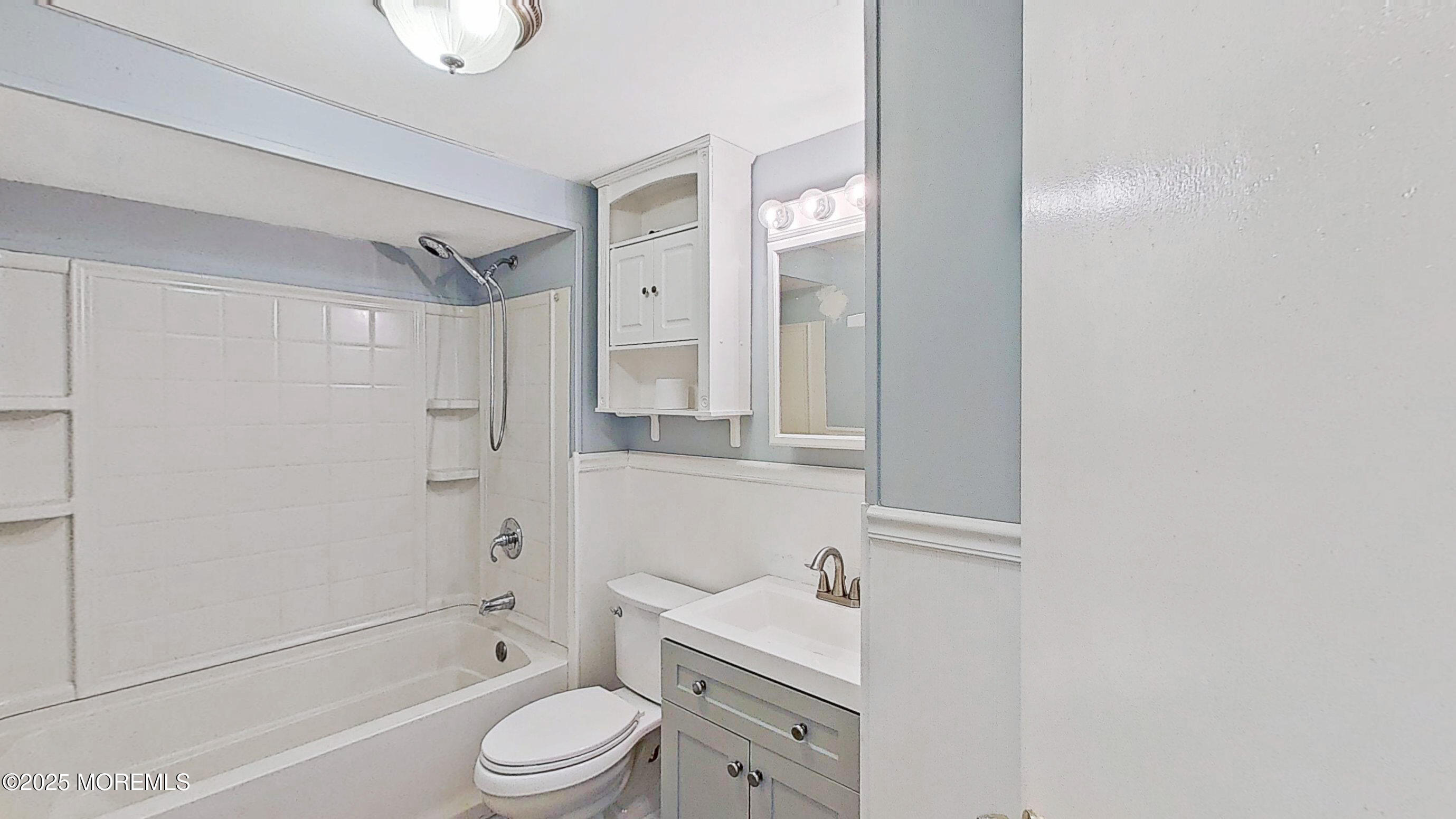224 Sunset Lane Howell, NJ 07731 - Photo 8 of 23 a bathroom with a sink a toilet and shower