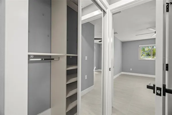 a view of an empty room and window