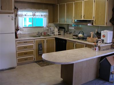 58 Arthur Drive, Unit 58 Santa Rosa, CA 95403 - Photo 6 of 12 Efficient kitchen with breakfast bar.