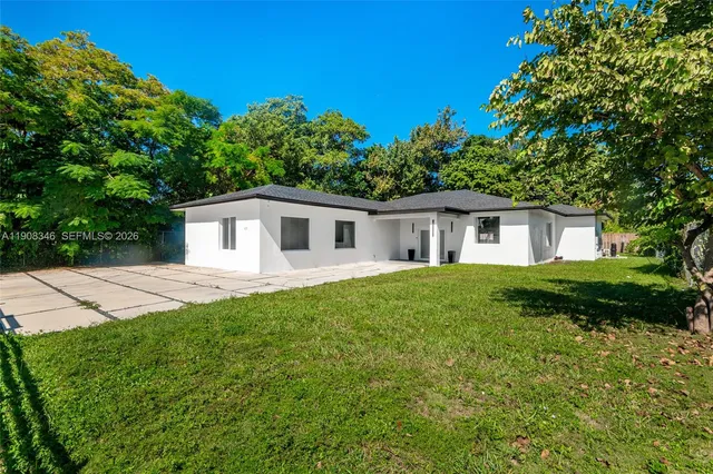 a view of a house with a patio